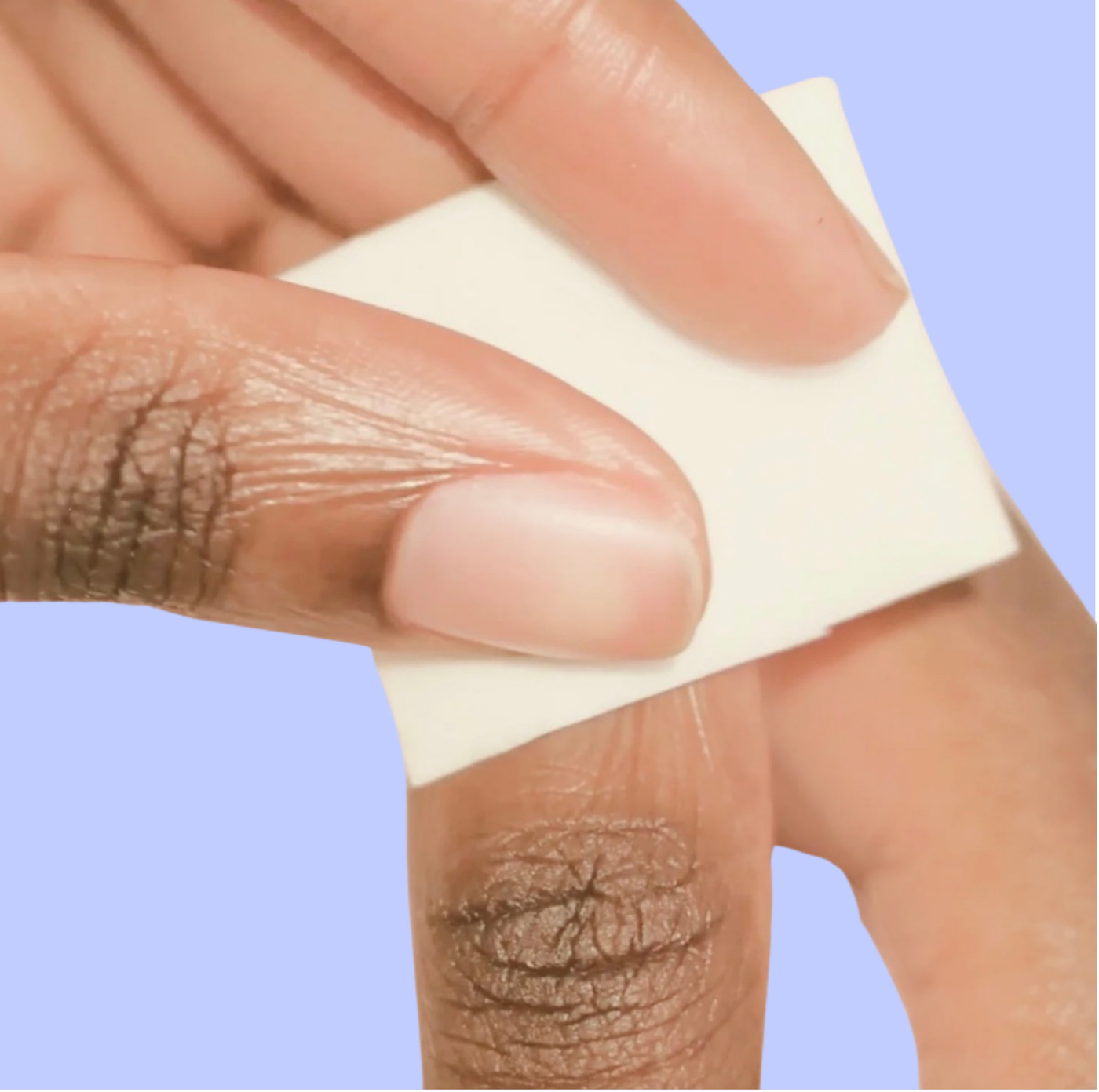 Use a cotton or tissue to wipe off the nail dust