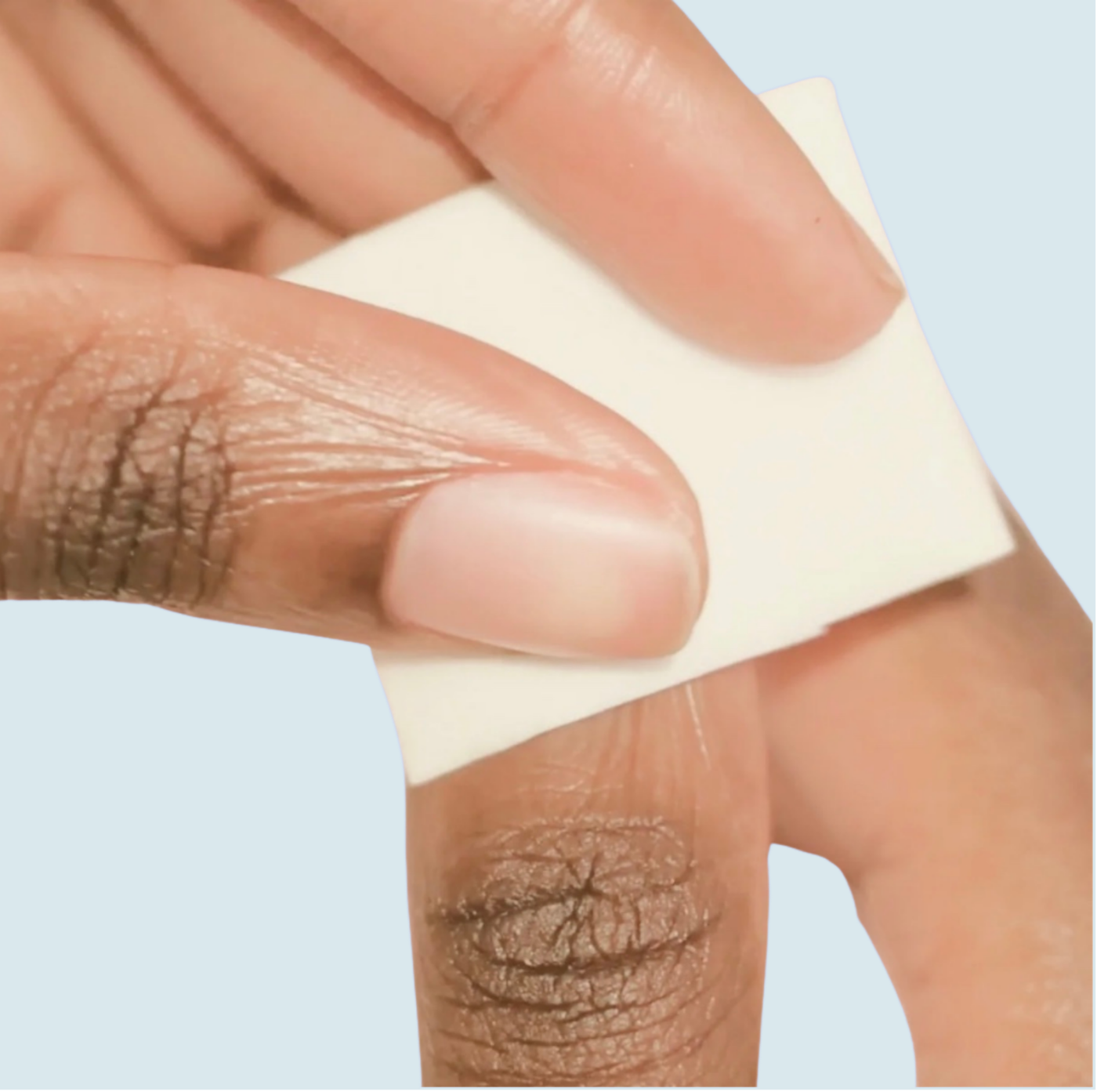 Use a cotton or tissue to remove nail dust. Now use the nail polisher to seek that natural finish.